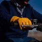 OR-OG driver gripping an ATV handlebar